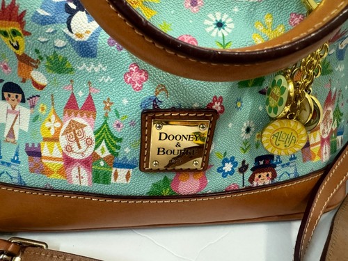 Dooney & Bourke Disney Parks It's A Small World Zip Satchel Bag w/ Charms - Picture 2 of 14