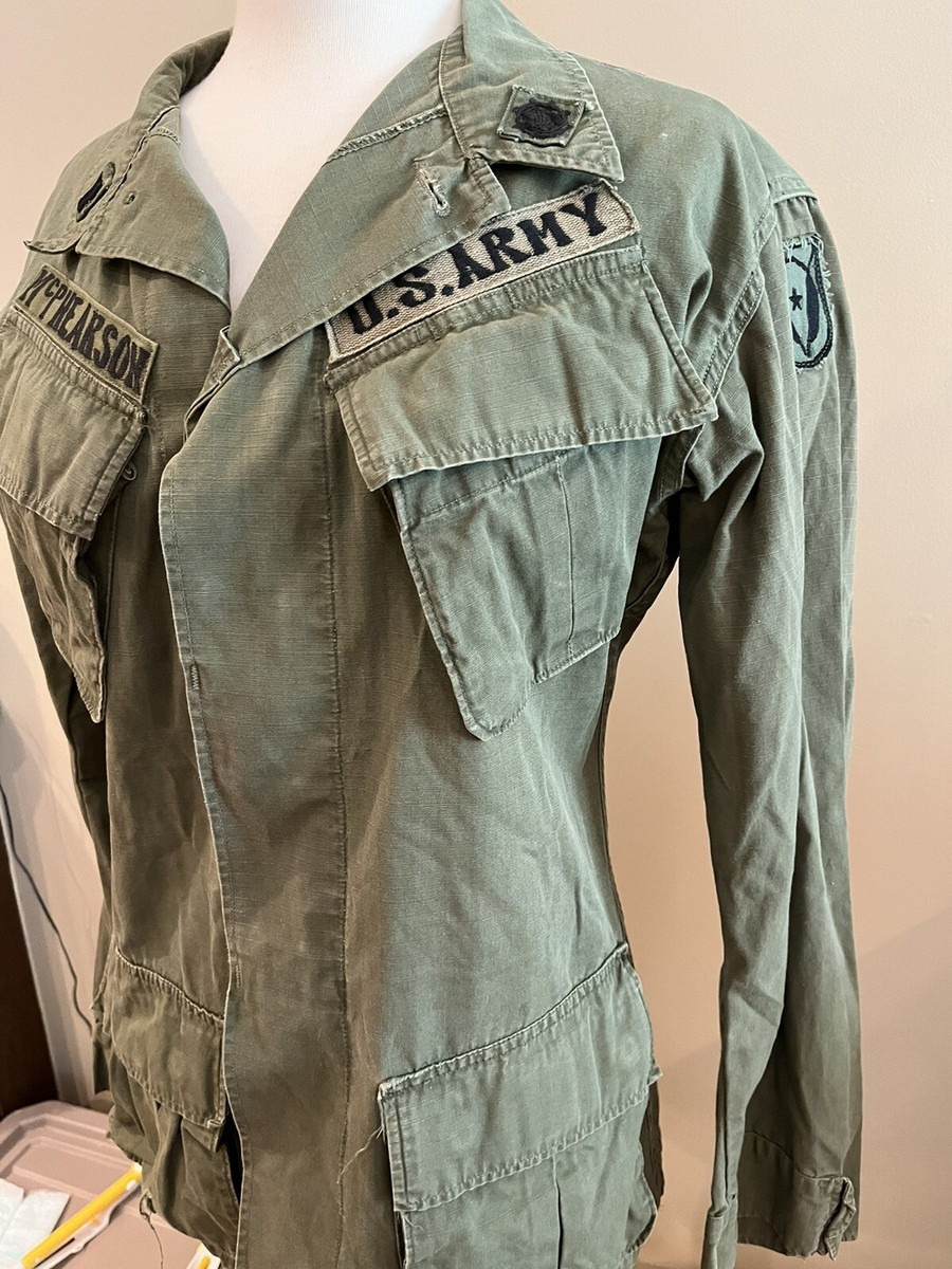 Vietnam war fatigue jacket in country made patches named