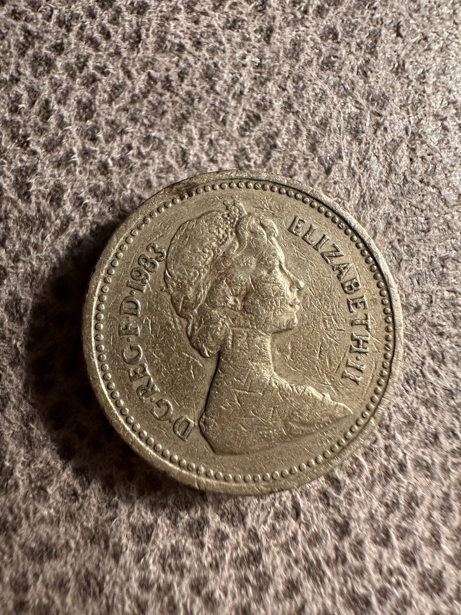 1983 RARE QUEEN ELIZABETH II ONE POUND COIN ERROR (UPSIDE