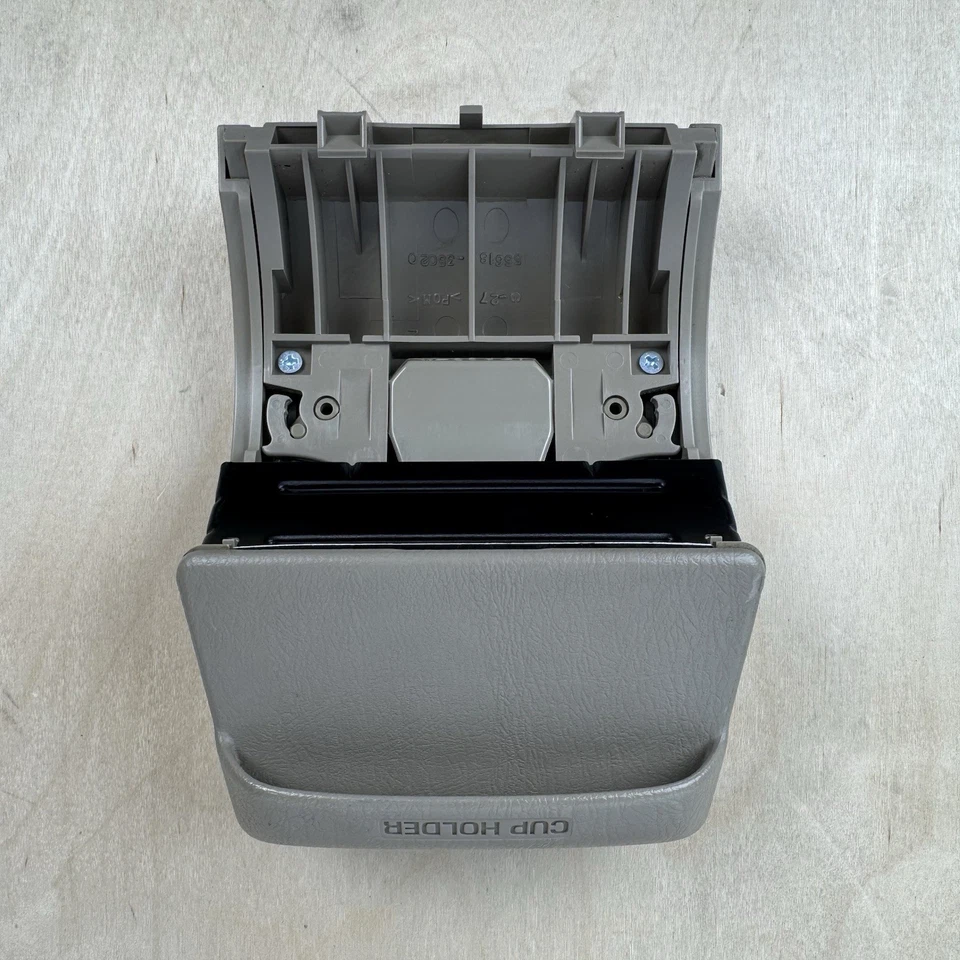 Portavasos consola trasera Toyota Corolla 1998-2002 marrón OEM 55630-02010 Foto 2 de 4