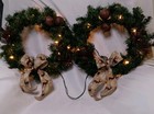 2 Pre Lit Wreaths warm lights into the foliage W/ reindeer and Brown Pinecone