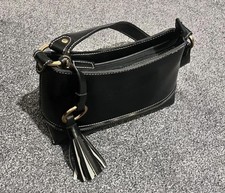 Emilie M. Black Faux Leather Baguette Shoulder Bag with Tassel Detail