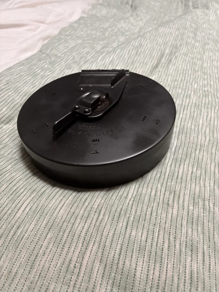 Cargador de batería Thompson calibre 45 10 R Foto 2 de 4