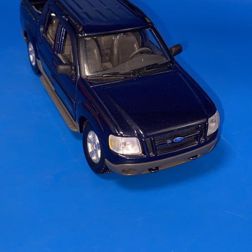 Maisto Ford Explorer Sport Trac Special Edition 1/25 & 1:24 rot BMW Z28 Menge 2 - Bild 19 von 22