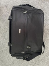 Pierre Cardin Travel Bag. Unisex; Black: Shoulder Strap And Handle.