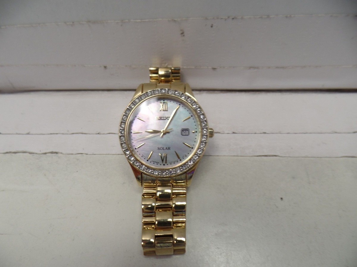Seiko Women's V137 Gold Tone Mother Of Pearl Solar Watch