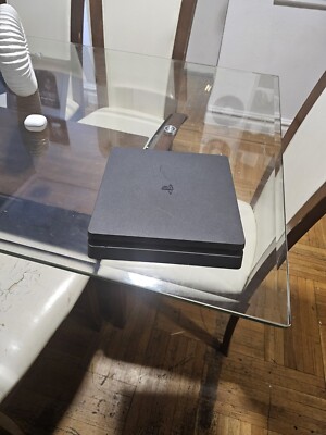 Ps4 Console And Games And A Backbone For Iphones