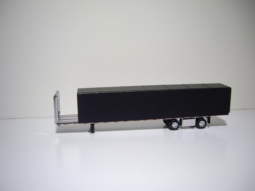 DCP FIRST GEAR 1/64 TEAL PETE 579 WITH SLEEPER AND SIMULATED ROLL TARP TRAILER - Picture 12 of 12