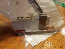 New in bag SMC solenoid valve SY3120-5L-M5, with lead wires.