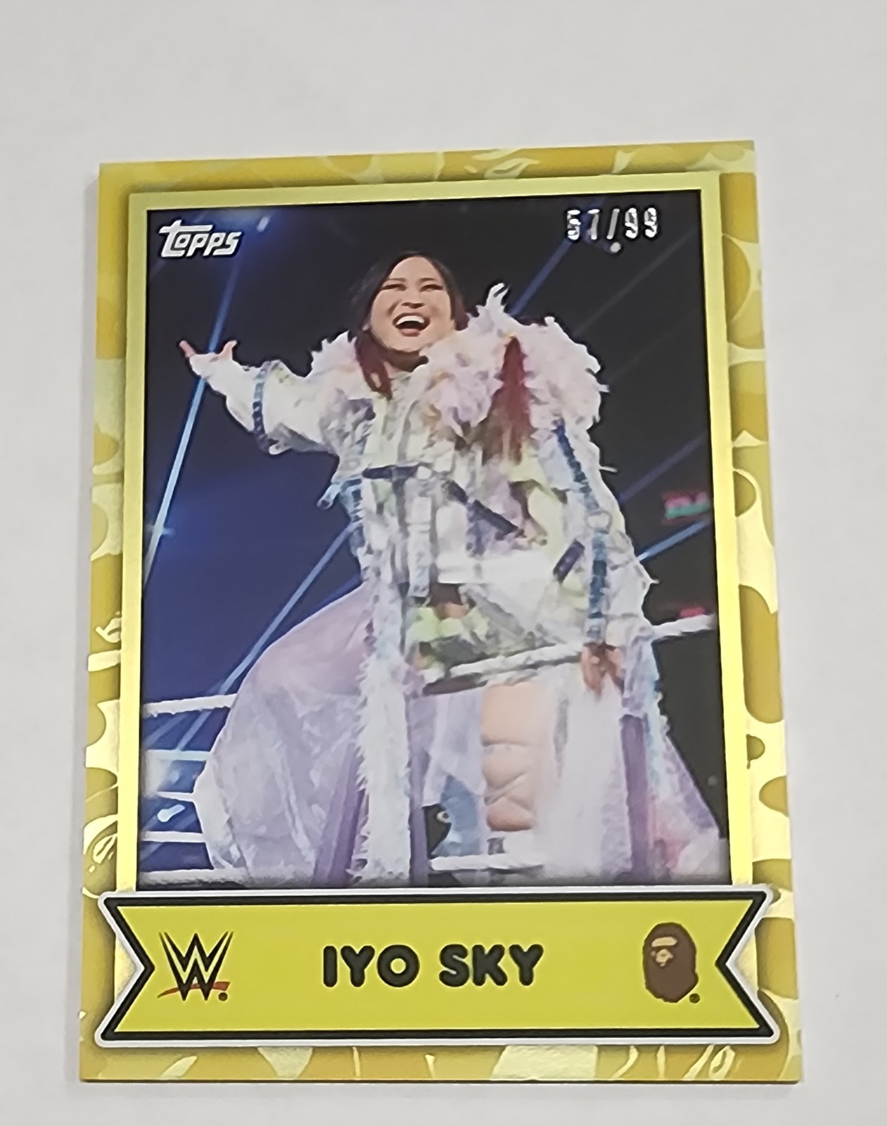 2025 Topps WWE X BAPE Iyo Sky Yellow Camo 57 /99