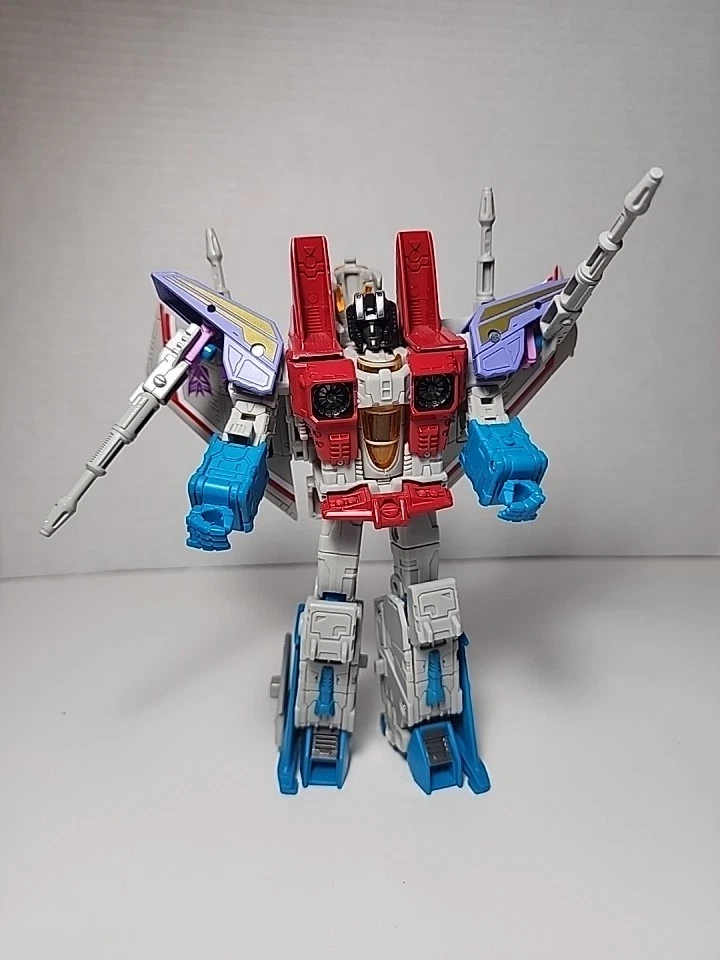 Lote de figuras de acción Transformers Starscream. Incluye pistola Kaiyodo Stars crema con Foto 2 de 4
