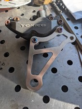 Tokico Springer Caliper Mount 11.5 Rotor Tokico Springer Caliper Mount 11.5 Rotor