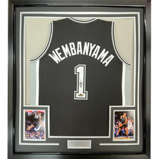 Framed Facsimile Autographed Victor Wembanyama 33x42 Black Reprint Laser Jersey