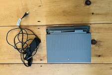 Apple PowerBook 150, for repairing or parts, plus power adapter