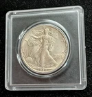 Silver 1939 P  Walking Liberty Half Dollar in plastic holder   TP 10252