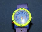 VINTAGE TIMEX INDIGLO PURPLE FACE WRISTWATCH WORKING CONDITION