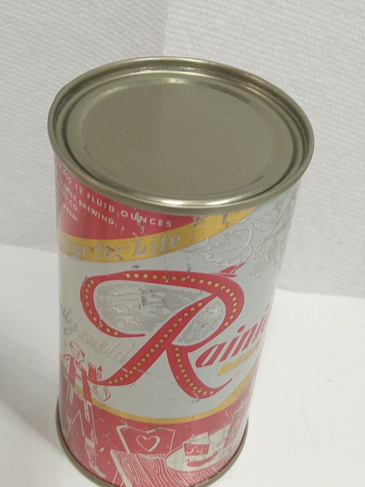 Red Rainier flat top Beer Can (Guy holding beer Stein, pretzels)