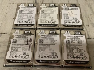 (4) Western Digital 320GB Festplatte - WD3200BEKT-75PVMT0, (2) WD2500BJKT-75F4T0 - Bild 1 von 19