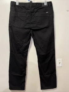 Pantalones de mezclilla elásticos de pierna recta ajustados negros 38x32 de Prana Bridger para hombre orgánicos - Imagen 1 de 12