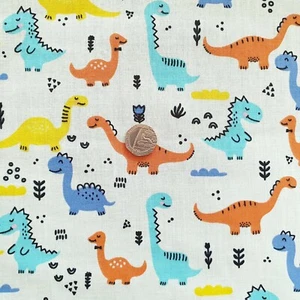 Tela multicolor estampada de dinosaurios animales niños polialgodón - 1 metro completo - Imagen 1 de 2