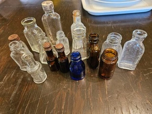 Lot Of Antique Empty Colored/Clear Glass Bottles Some Raised Labels/Calibrated - Picture 1 of 5