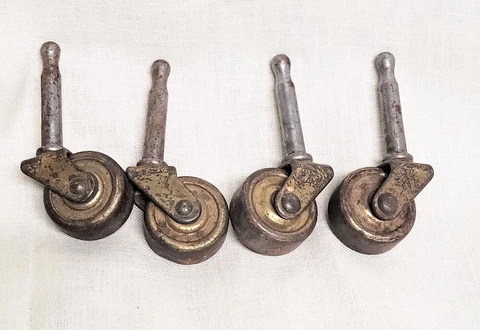 Antique Brass Plated Iron Casters 1 1/8th inches Cover