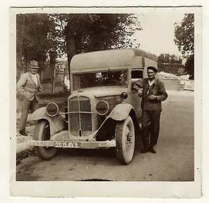 TWO MEN AND A TRUCK IN TAGNON, ARDENNES, FRANCE (1942) - Picture 1 of 3