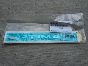 NEW OEM Kia 2016-2020 Optima FE Emblem 86310-D4100 - Picture 1 of 3