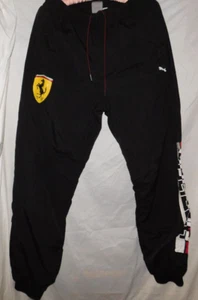 Pantalones deportivos Puma negros Scuderia Ferrari Street tejidos de malla forrados de nailon para hombre M - Imagen 1 de 11