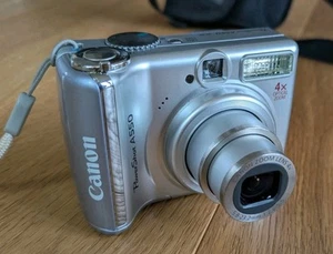 Canon PowerShot A550 Ai, 7.1 Megapixel Digitalkamera AA 4x optischer Zoom top - Bild 1 von 10