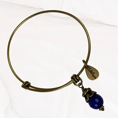 Pulsera Bella Ryan Tono Dorado Cuentas Azules Piedra Natal Dije Foto 1 de 4