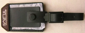 TUMI LUGGAGE BAG ID TAG NEW, BLACK, DARK BROWN STRIP, SILVER LOGO 3 1/4"x2 1/8" - Picture 1 of 2