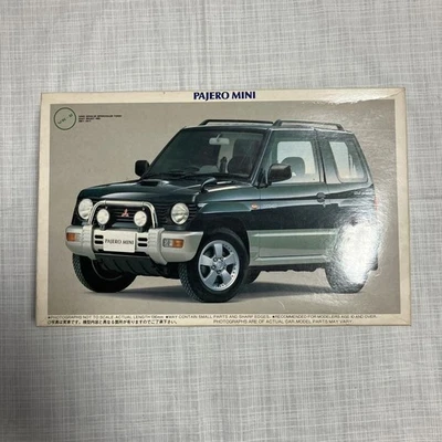 Mini voiture Mitsubishi Pajero Mini VR-II échelle 124 non ouverte état d'usage - Photo 1/4