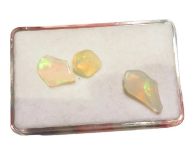 Edelopal Äthiopien Rohstein poliert 8,4-16,2 mm 5.5 ct. U34381 - Bild 1 von 2