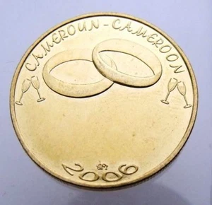 CAMERÚN 7500 FRANCOS CFA - 5 ÁFRICA 2006 KM31 DOS ANILLOS DE BODA GATO. 45$ UNC MONEDA - Imagen 1 de 2