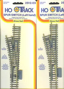 HO AHM "TRACKSIDE" INTERRUTTORE A 2 SPERONI MANO SINISTRA OTTONE LAYOUT TRENO IHC AHM - Foto 1 di 1