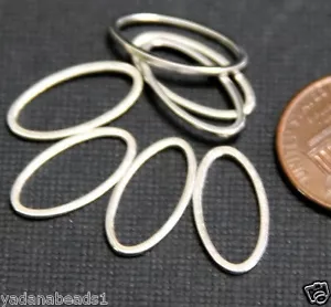 50 pezzi di maglie ovali placcate argento 16x8x1mm - Foto 1 di 1