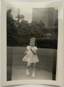 Vintage 1940s Snapshot Young Girl Child Playing Dancing Outside in the City NYC - Picture 1 of 2