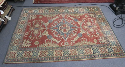 Alfombra de lana kazaja 4'3 X 6' anudada a mano Pak Peshawar Chobi óxido Foto 1 de 4