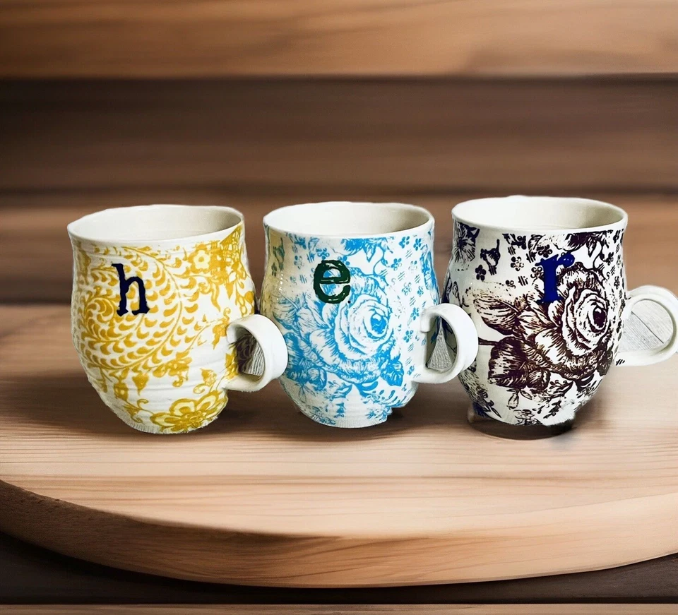 ANTHROPOLOGIE “H.E.R” Tazas de café de cosecha propia ~ 41/4" ~ Juego floral amarillo, azul y marrón Foto 1 de 4