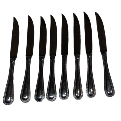 NUEVO EN CAJA Juego de ocho cuchillos para carne de toalla de acero inoxidable de 9" de largo. Usado en excelente estado. Sin caja Foto 1 de 4