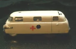 SCHUCO METALLO AVVOLGIMENTO ANNI '50 VARIANTE-SANI GIOCATTOLO AMBULANZA 3043 USA ZONA GERMANIA - Foto 1 di 12
