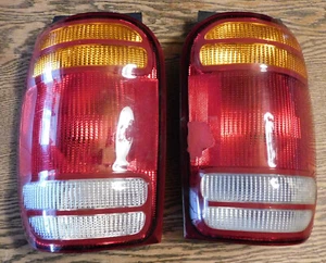 USED 1 GOOD LEFT FORD TAIL LIGHT+ 1 DAMAGED RIGHT- Fits: 1998-2001 Ford Explorer - Picture 1 of 9