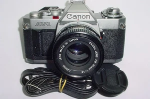 Canon AV-1 35mm fotocamera reflex pellicola manuale + obiettivo Canon 50/1.8 FD - perfettamente funzionante - Foto 1 di 6