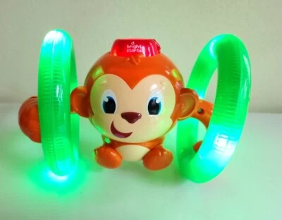 "Juguete musical iluminado para niños Kids II Bright Stars Rolling Monkey funciona 7""" Foto 1 de 3