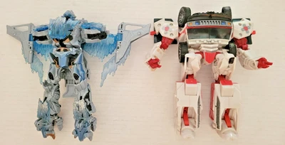 Rescue Ratchet & Frozen Megatron Voyager Class Hasbro Action Figures Incomplete - Image 1 of 4