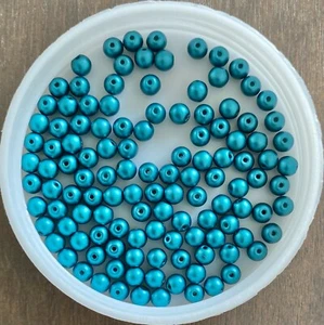 Czech Pressed Glass Druk Beads. Pastel Emerald (25043). 4mm. 100/pack. - Picture 1 of 1