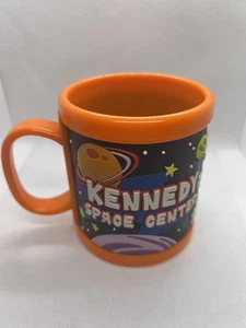 Kennedy Space Center Kinder Tasse Space Astronaut Souvenir orange Tasse gebraucht - Bild 1 von 6