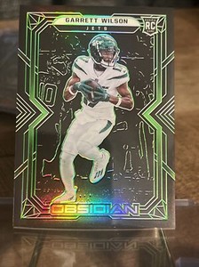2022 Obsidian Electric Etch Green Garrett Wilson Rookie /50