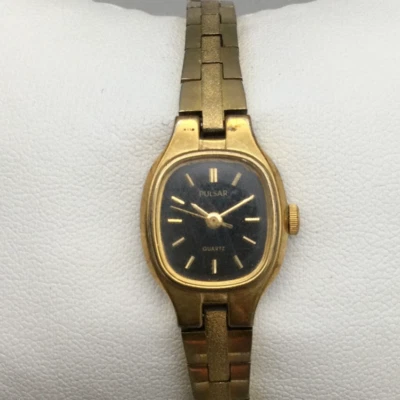 Reloj Pulsar Vintage Mujer 16mm Tono Dorado Esfera Negra V811-5300 Batería Nueva 6.75" Foto 1 de 4